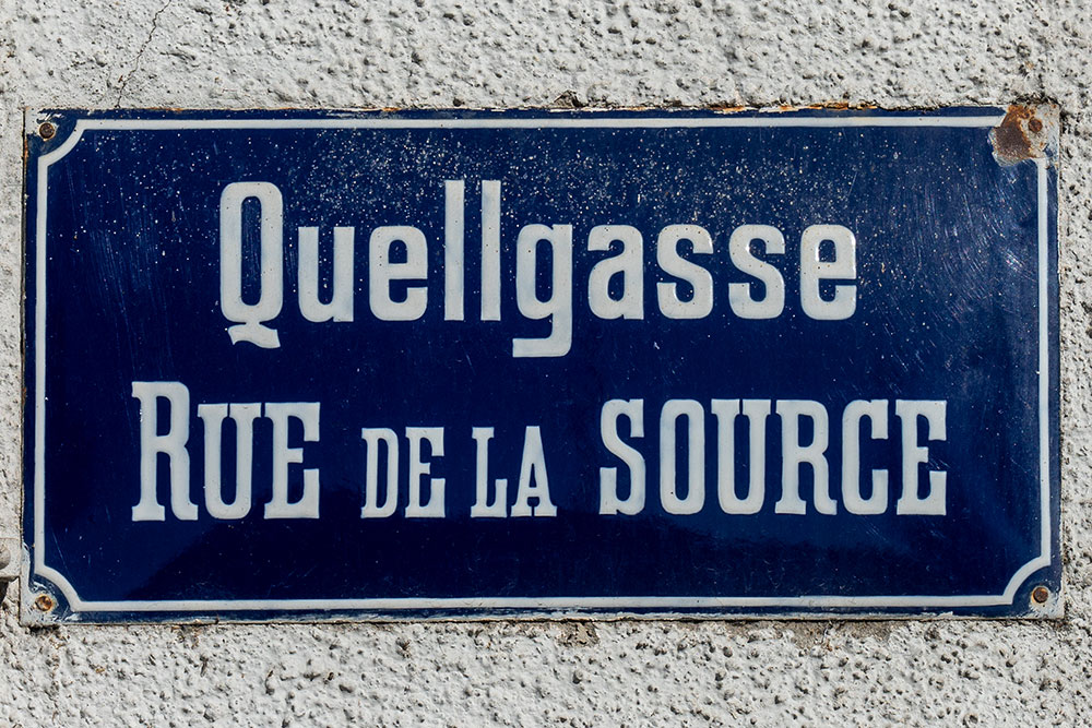 zweisprachig bilingue